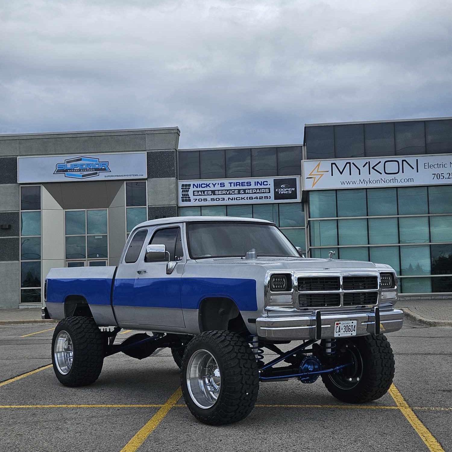 Lifted Dodge truck with oversized off-road tires